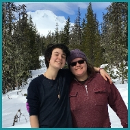 Calvin and Leci take a break from building an igloo during the winter group trip to Mount Hood.