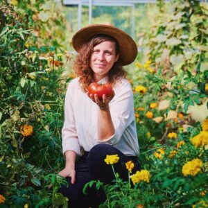 Kindness farmer with tomato